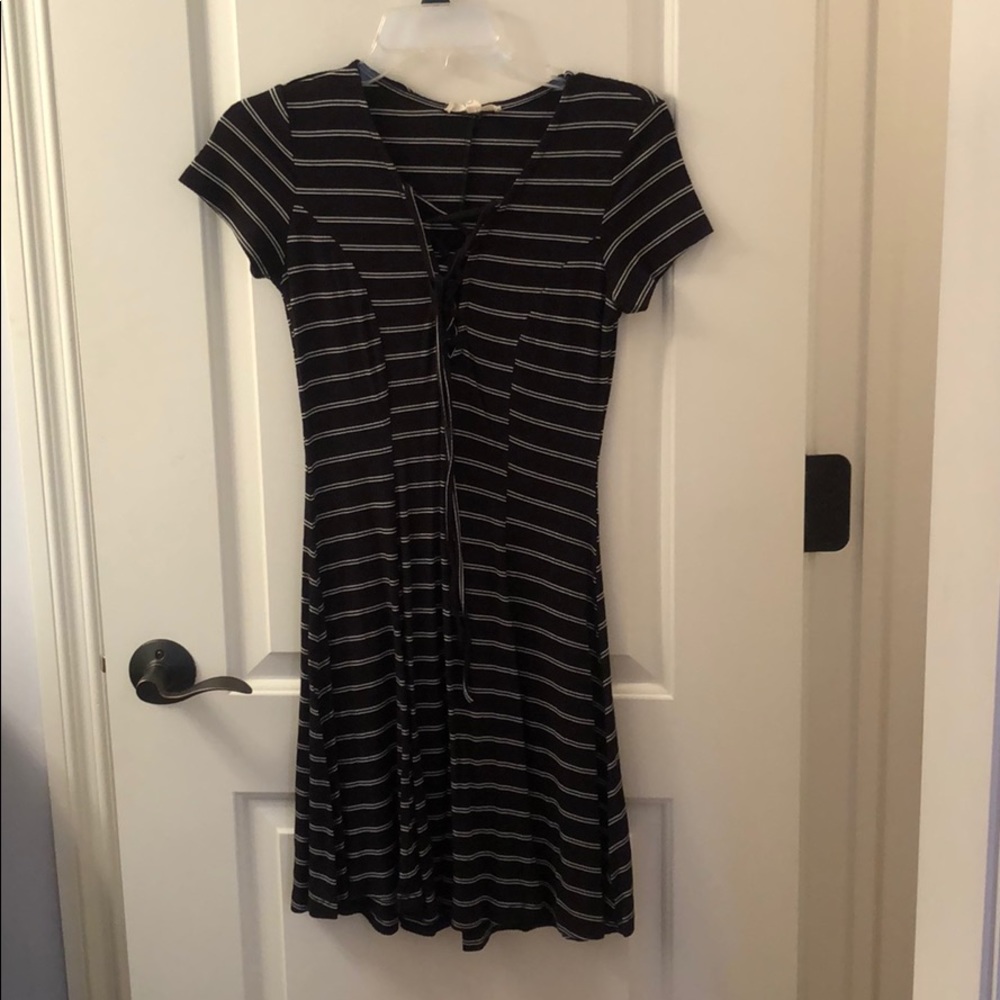 Black and white lace up front dress